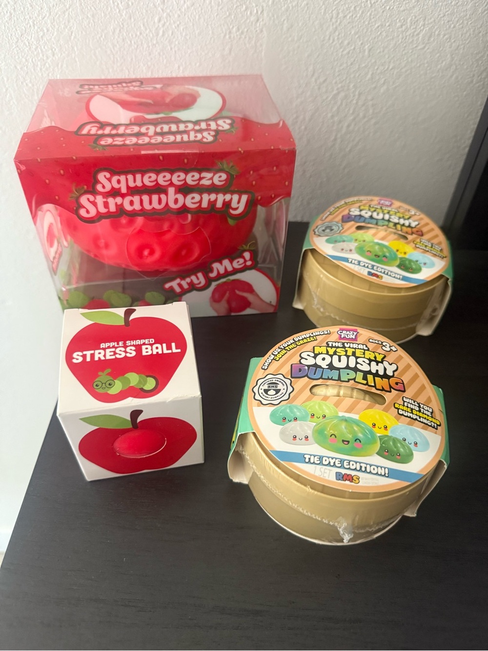 Squish lot Squeezee Strawberry Stress Toy & Mystery Squishy DumplingsRedGreenTan